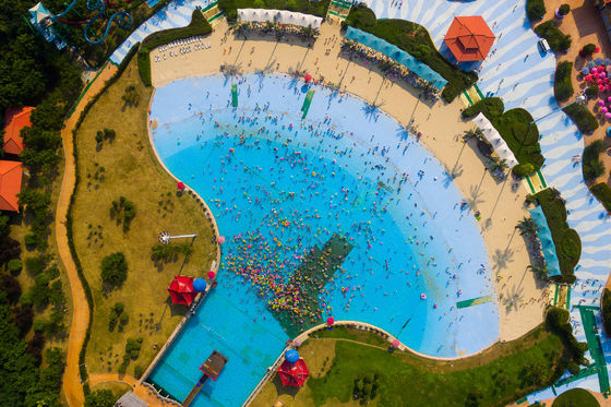 قیمت خوب OEM Aqua Water Park Big Blue Tsunami Wave Pool Anti UV Steel Artificial Surf  Machine for Sale آنلاین